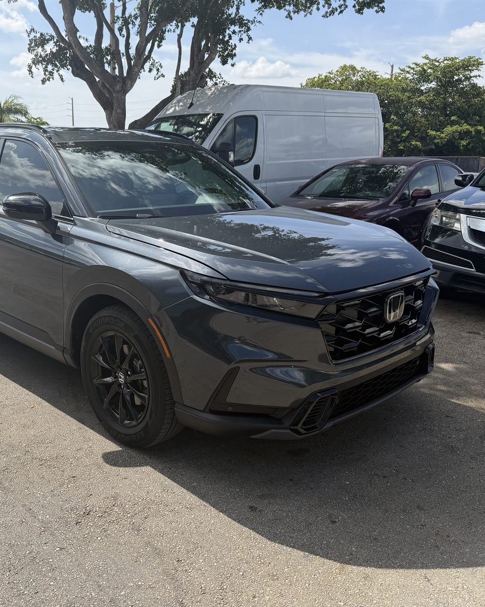Honda CR-V front-end collision repair at Automotive World Collision Center — before and after comparison
