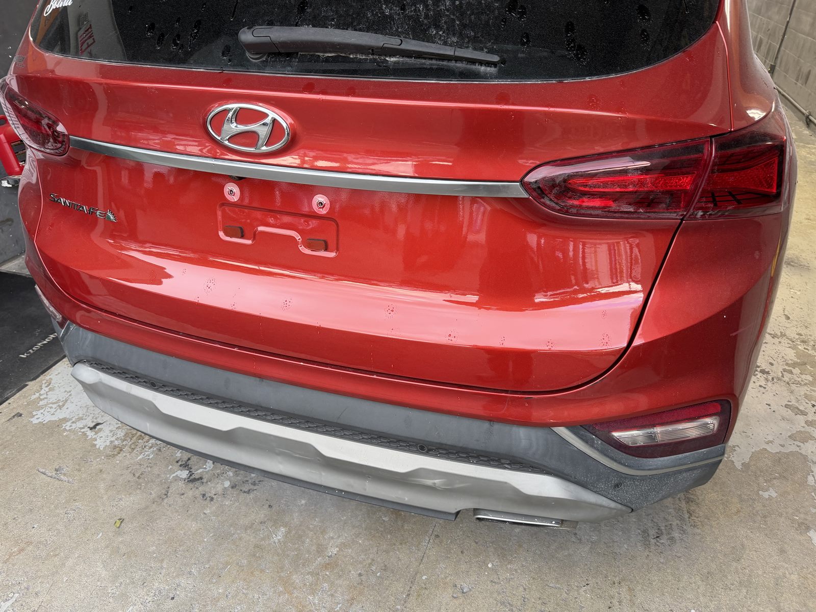 Hyundai Santa Fe tailgate dent repaired — factory finish restored